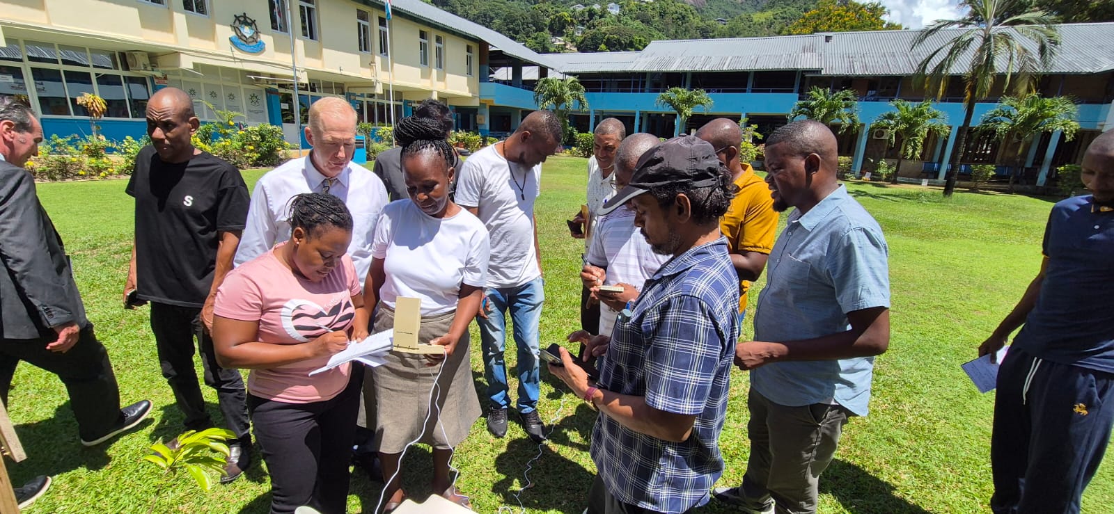 People outside collecting data.